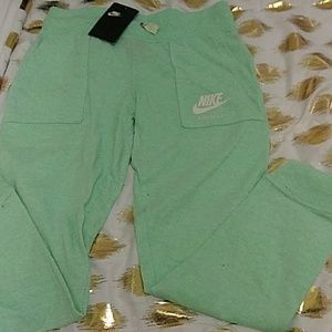 Mint green girls nike pants size lg 12-13 years